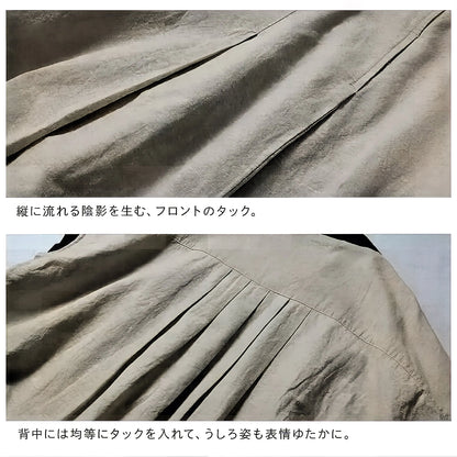 凛とした配色で引き締める、贅沢シルエットの生成り服