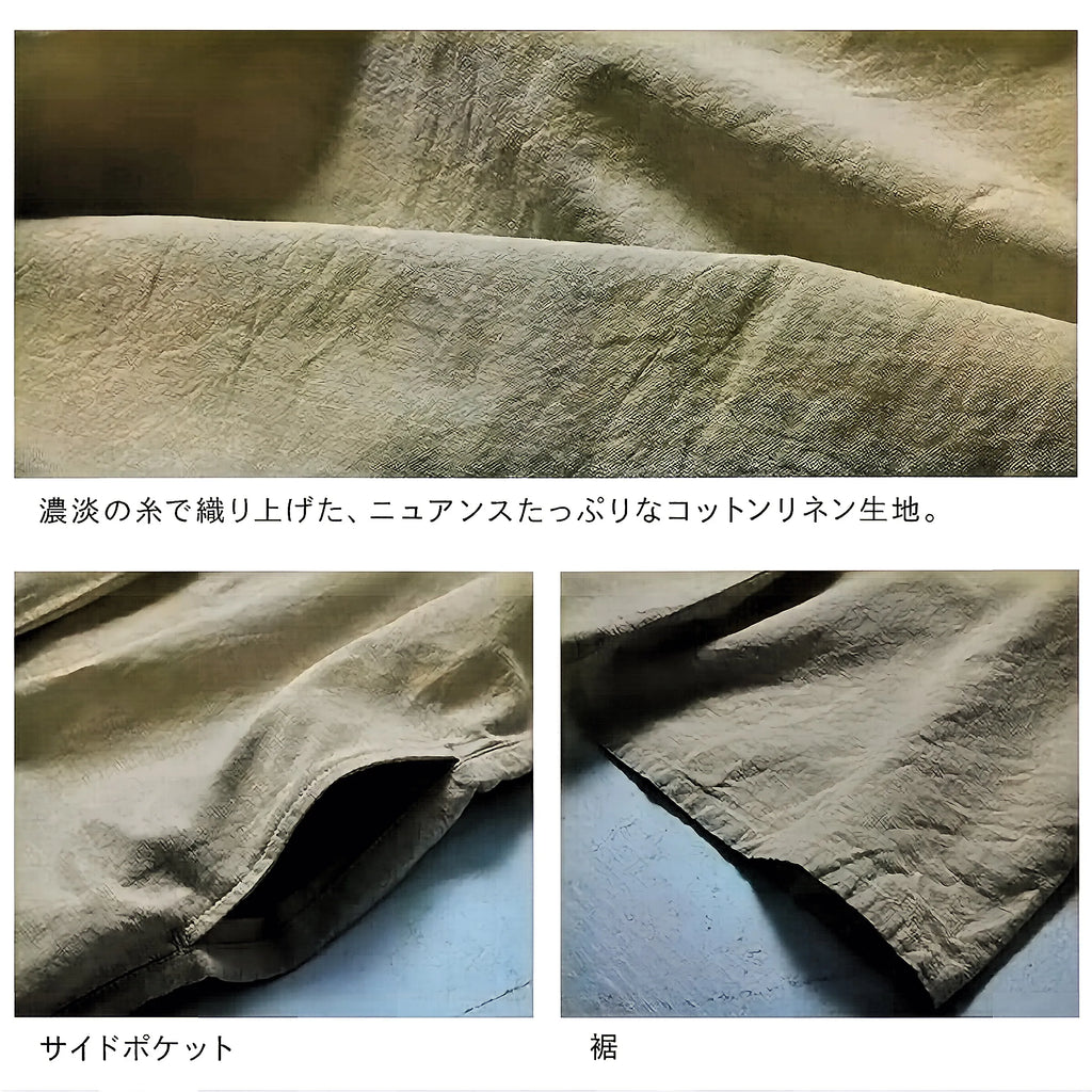 凛とした配色で引き締める、贅沢シルエットの生成り服