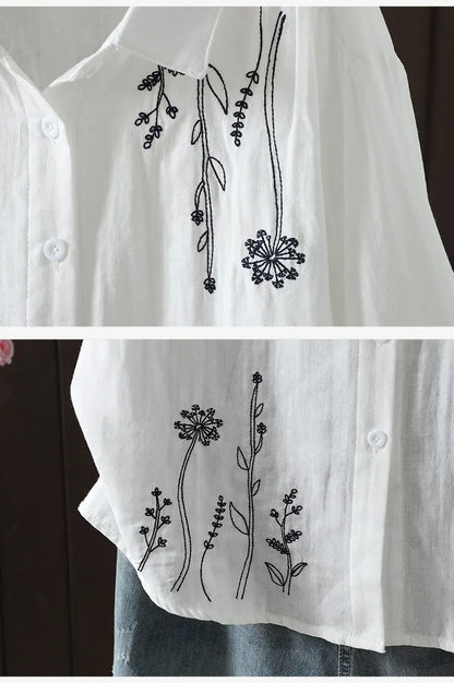 アンティークな刺繍を胸に、からだが泳ぐルーズな５分袖トップス