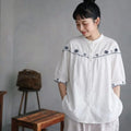 刺繍が咲く、コットンリネンのシャツ